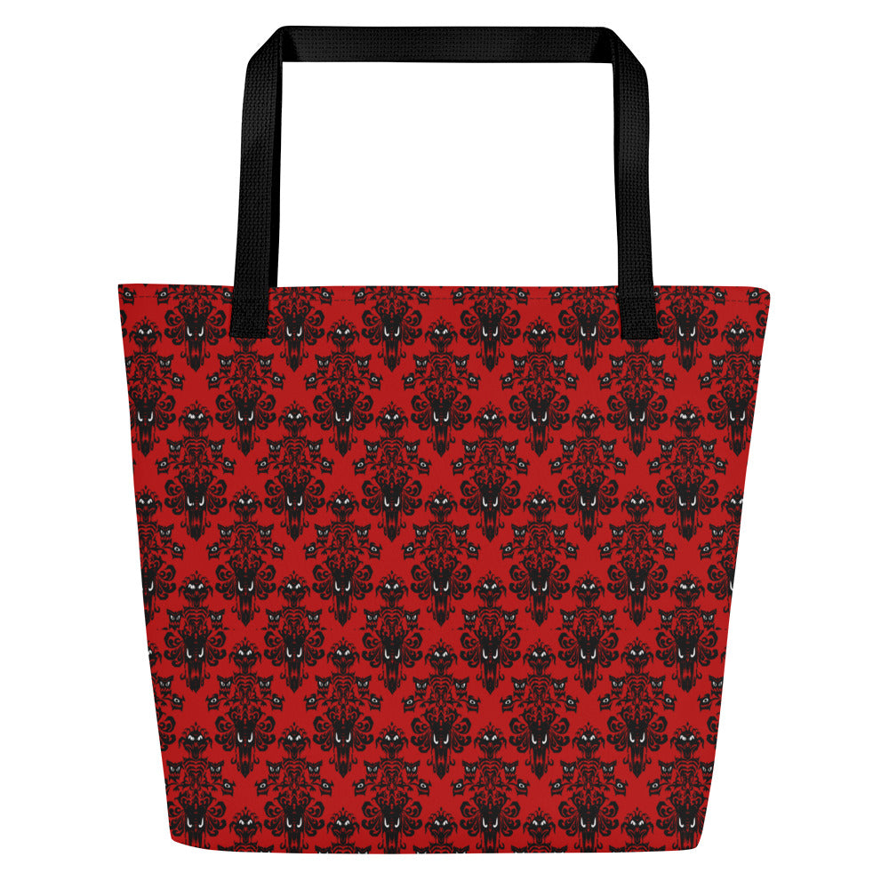Red Haunted Mansion artwork on unisex tote bag, front view