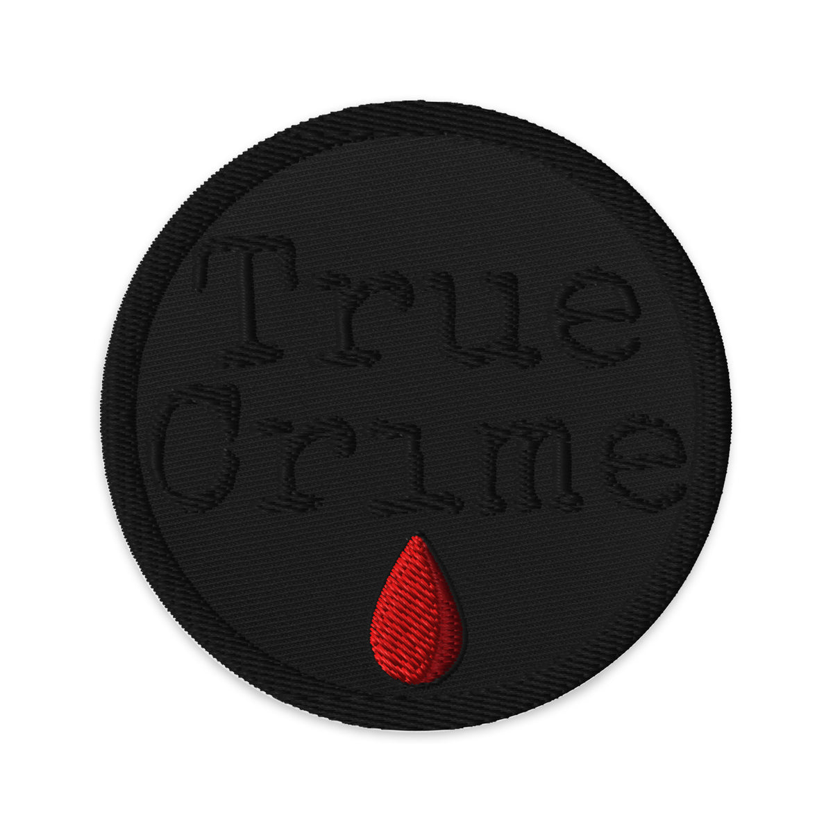 Circular embroidered patch featuring True Crime Blood Drop, front view