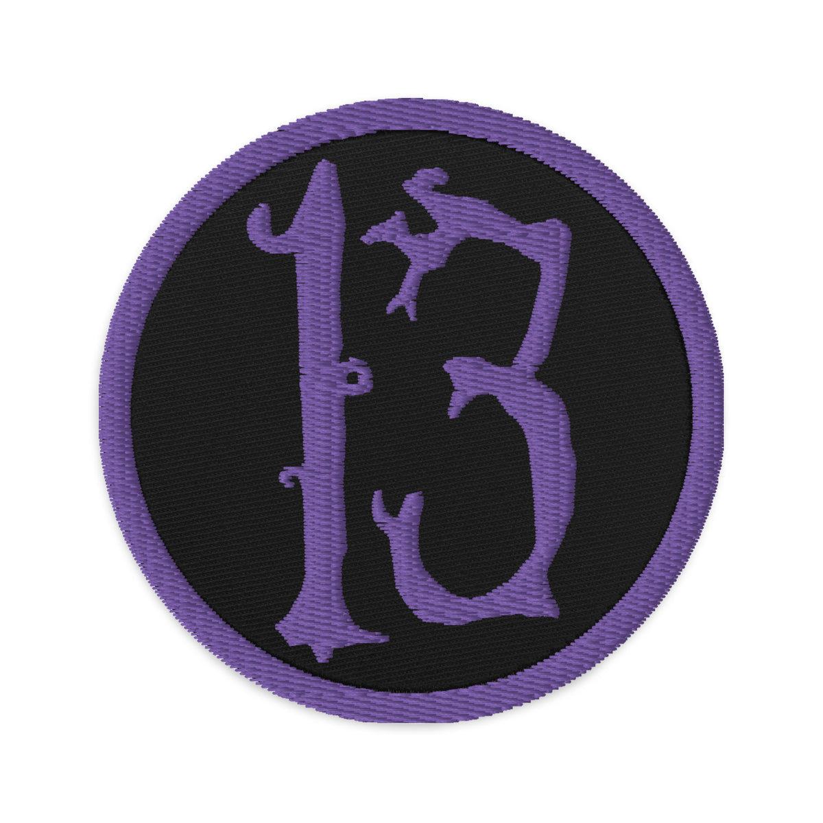 Circular embroidered patch featuring Purple Lucky Number 13 Goth Halloween #, front view