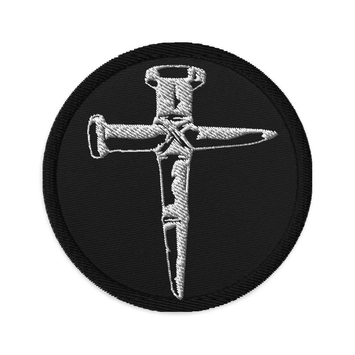 Circular embroidered patch featuring Wooden Stakes Cross, front view