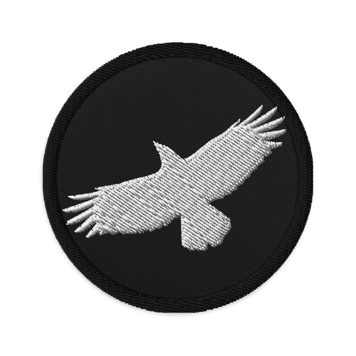 Circular embroidered patch featuring Flying Raven Black Bird, front view