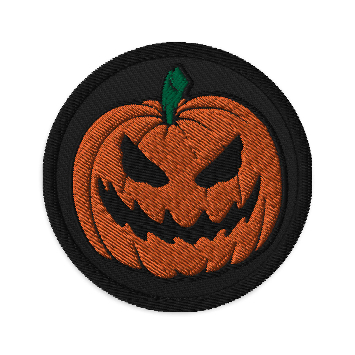 Circular embroidered patch featuring Scary Jack O Lantern Halloween Pumpkin, front view