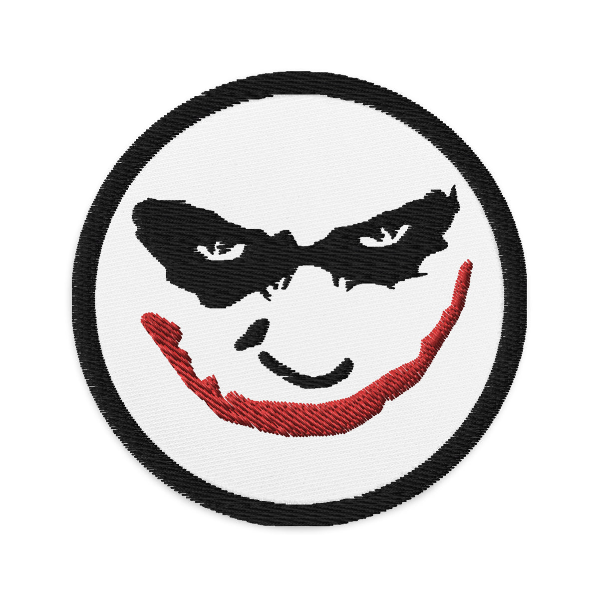 Circular embroidered patch featuring Evil Grin Joker, front view