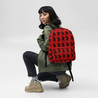 Red Krampus artwork on unisex backpack, front view