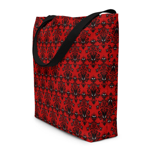 Red Haunted Mansion artwork on unisex tote bag, front view