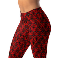 Red Haunted Mansion pattern on women's leggings, left-front view