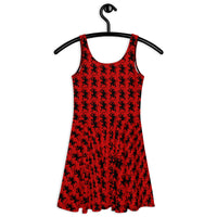 Red Krampus pattern on women's skater dress, back view