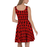 Red Krampus pattern on women's skater dress, back view