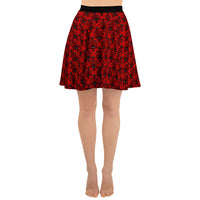 Red Haunted Mansion pattern on women's skater skirt, front view