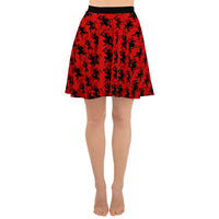 Red Krampus pattern on women's skater skirt, front view