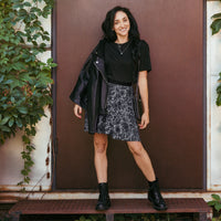 Black Rose Lace pattern on women's skater skirt, front view