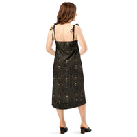 Skull Carnival pattern on women's tie-strap slip dress, back view