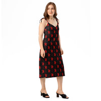 Black Krampus pattern on women's tie-strap slip dress, right-front view