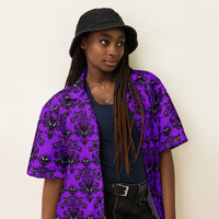 Purple Haunted Mansion patterned button-up shirt, right-front view