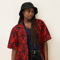 Red Haunted Mansion patterned button-up shirt, right-front view