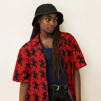 Red Krampus patterned button-up shirt, right-front view