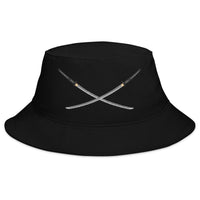 Black bucket hat with Dual Samurai Swords Anime Warrior embroidered artwork, front view