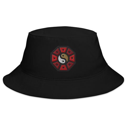 Black bucket hat with Yin Yang Chinese Wheel embroidered artwork, front view