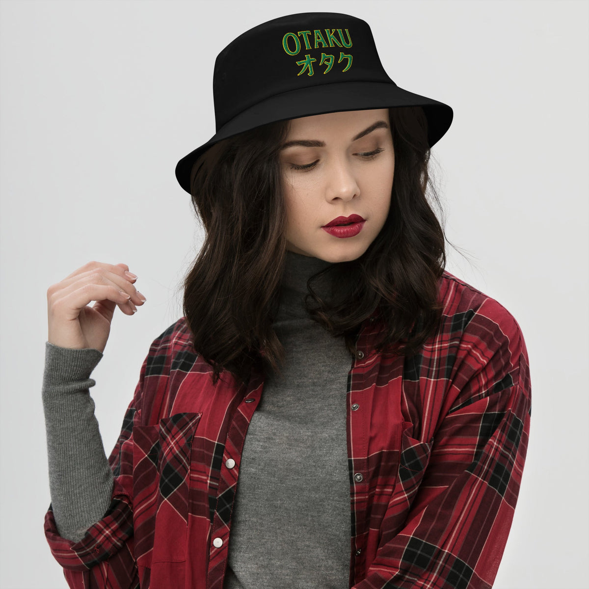Black bucket hat with Otaku オタク Japanese embroidered artwork, front view