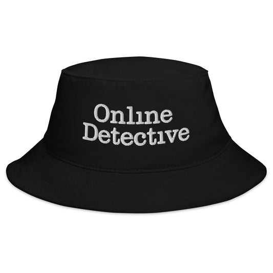 Black bucket hat with Online Detective True Crime embroidered artwork, front view