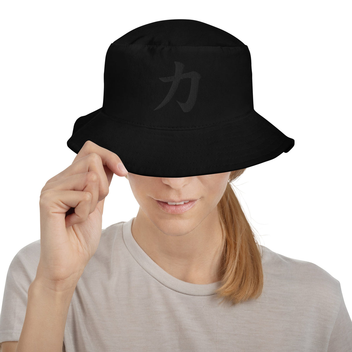 Black bucket hat with Power Kanji Symbol embroidered artwork, front view