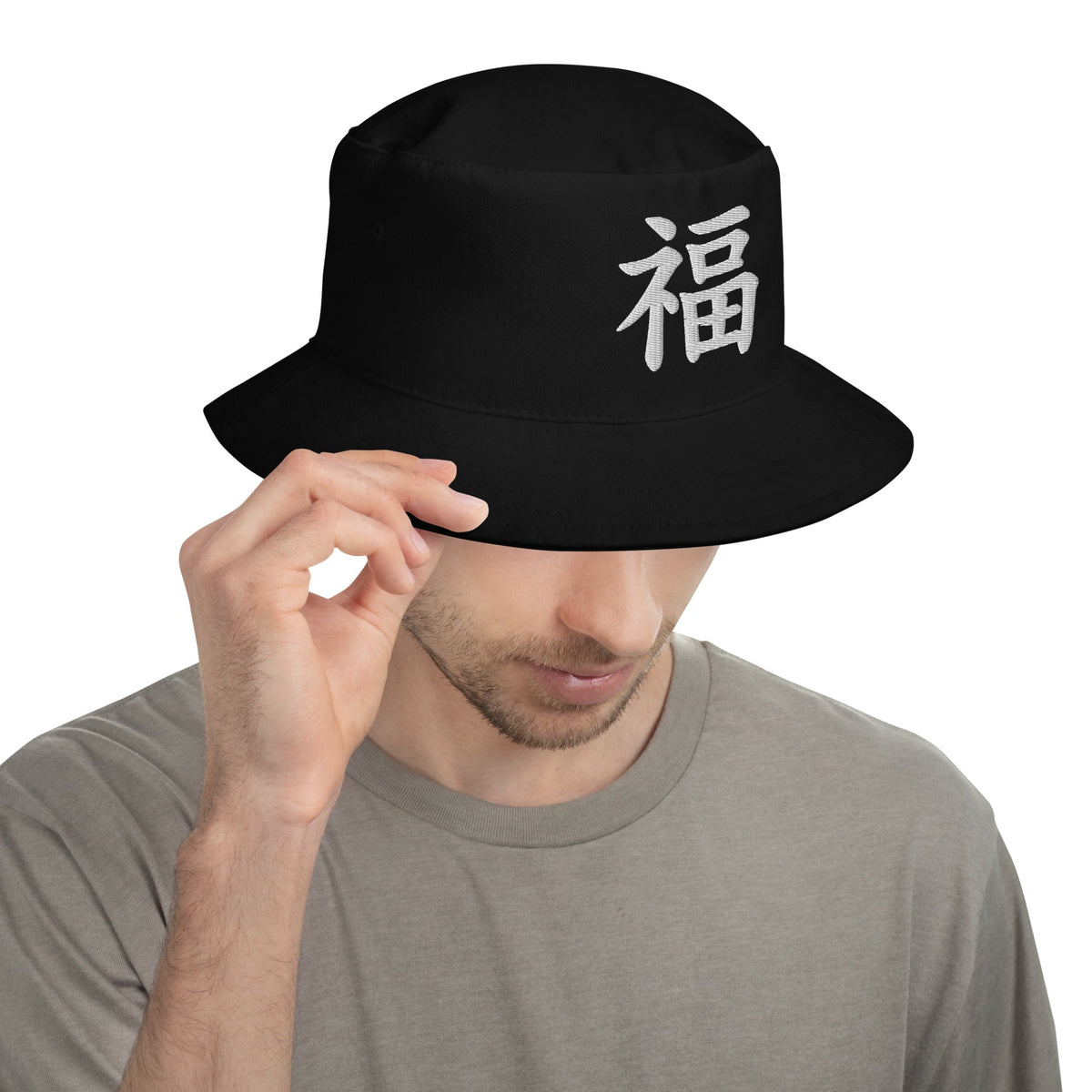 Black bucket hat with Japanese Kanji Fortune embroidered artwork, front view