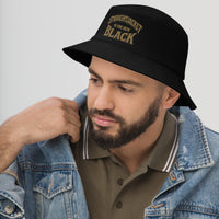 Black bucket hat with Straightjacket Is the New Black embroidered artwork, left-front view