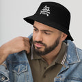 Black bucket hat with Japanese Kanji Void embroidered artwork, left-front view