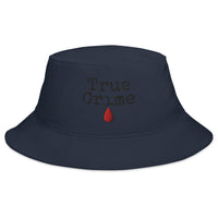 Navy bucket hat with True Crime Blood Drop embroidered artwork, front view