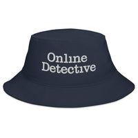 Navy bucket hat with Online Detective True Crime embroidered artwork, front view