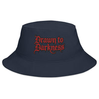 Navy bucket hat with Drawn to Darkness Horror embroidered artwork, front view
