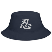 Navy bucket hat with Japanese Kanji Endure embroidered artwork, front view