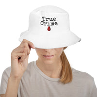 White bucket hat with True Crime Blood Drop embroidered artwork, front view