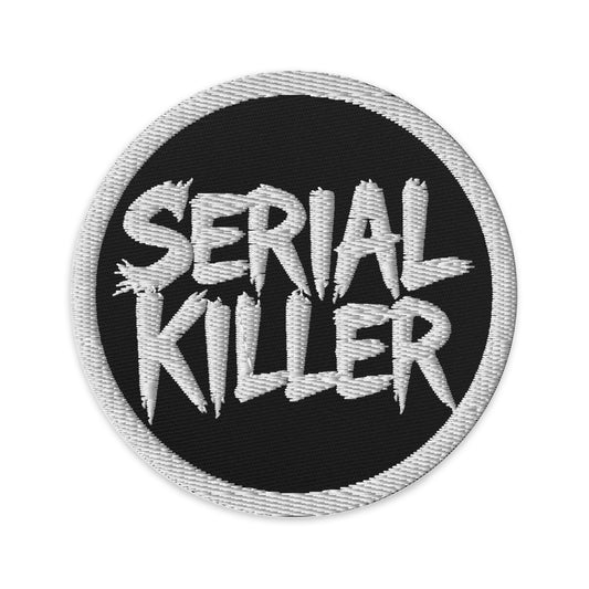 Circular embroidered patch featuring White Serial Killer True Crime, front view