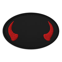 Oval embroidered patch featuring Red Devil Horns, front view