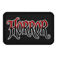 Rectangle embroidered patch featuring HORROR Iron On, front view