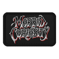 Rectangle embroidered patch featuring Morbid Curiosity Iron On, front view
