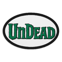 Oval embroidered patch featuring Undead Zombie Horror, front view