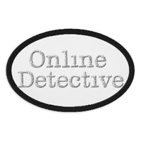Oval embroidered patch featuring Online Detective, front view