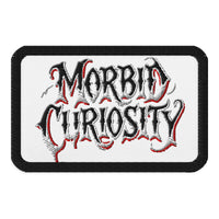 Rectangle embroidered patch featuring Morbid Curiosity Iron On, front view