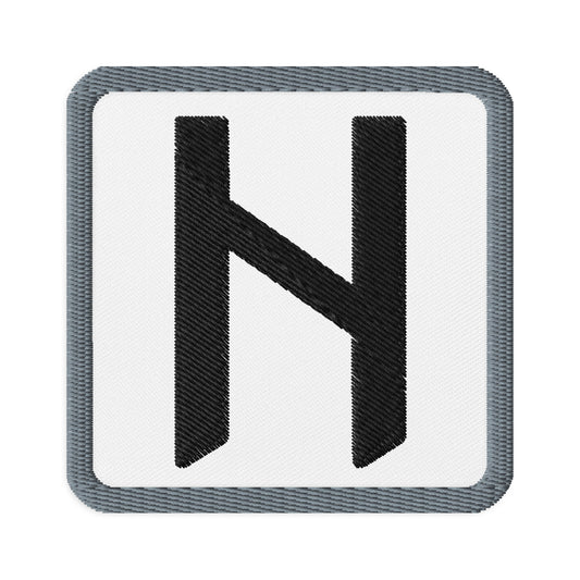 Square embroidered patch featuring Hagalaz Rune, front view