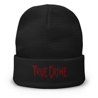 Black cuffed beanie with Blood Drip True Crime embroidered artwork, front view