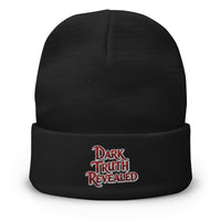 Black cuffed beanie with Dark Truth Revealed True Crime embroidered artwork, front view