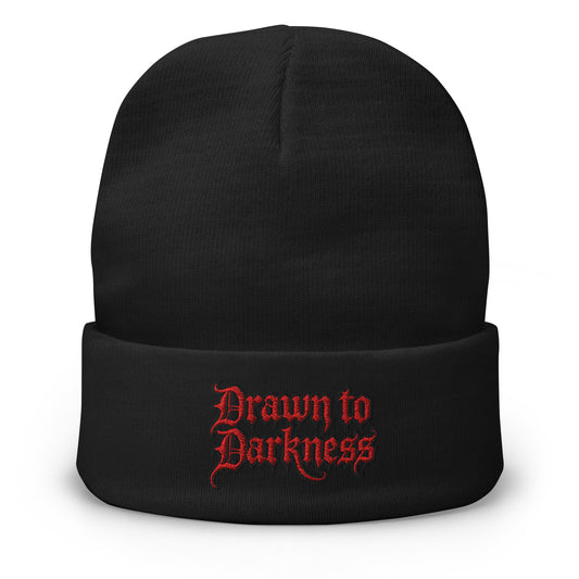 Black cuffed beanie with Drawn to Darkness Horror embroidered artwork, front view