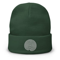Green cuffed beanie with Ancient Labyrinth Symbol embroidered artwork, front view