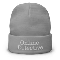 Gray cuffed beanie with Online Detective embroidered artwork, front view