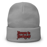 Gray cuffed beanie with Drawn to Darkness Horror embroidered artwork, front view