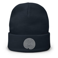 Navy cuffed beanie with Ancient Labyrinth Symbol embroidered artwork, front view