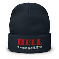 Navy cuffed beanie with Hell Is Where The Heart Is embroidered artwork, front view