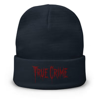Navy cuffed beanie with Blood Drip True Crime embroidered artwork, front view